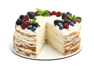 Tasty crepe cake with berries and mint isolated on white