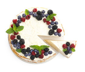 Tasty crepe cake with berries and mint isolated on white, top view