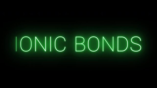 Flickering neon green Ionic bonds sign animated on black background.
