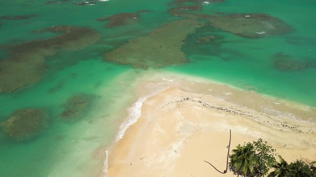 4K aerial footage of Punta Popy Beach &mdash; tropical postcard view of blue Caribbean waters. Ideal for social media travel reels