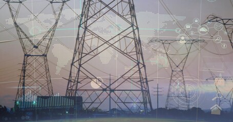 Showing high-voltage lattice tower transmitting power over plain at dusk, with digital data overlay