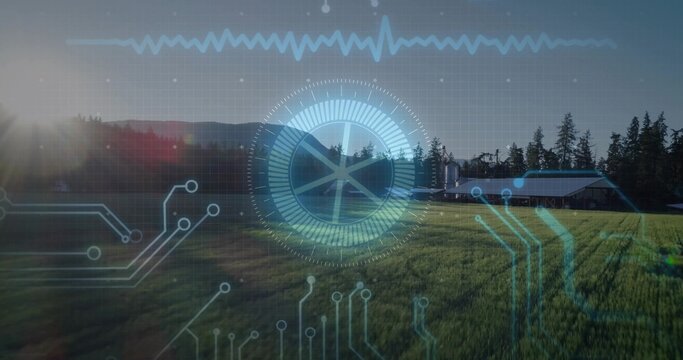 Naklejki Displaying central circular gauge overlaying farmland with sun glare lens flare, with barn silos