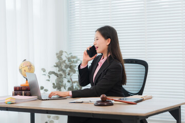 Obraz premium Asian Woman Lawyer Working in Office