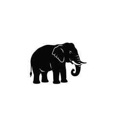A majestic black elephant stands powerfully a striking silhouette