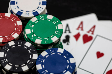 Casino chips and cards on the table. Gambling concept