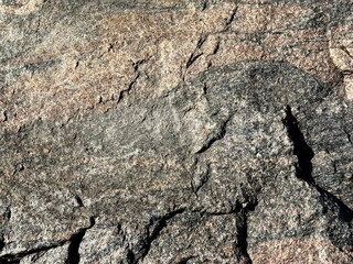 Stone granite rock solid gray background.