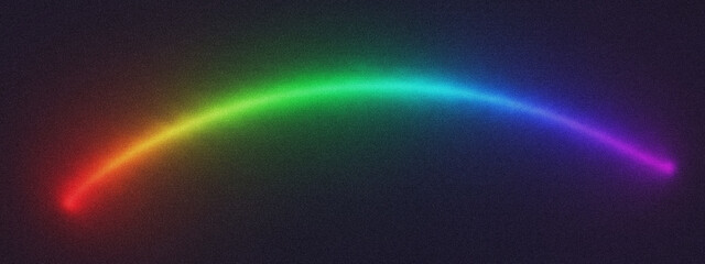 A vibrant rainbowcolored light streak curves across a dark, textured background, creating a sense of motion and magic