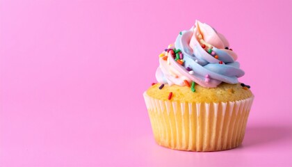 Sweet Cupcake with Colorful Frosting and Sprinkles Isolated on Pink Background for Bakery Dessert Object and Sweet Snack Concept