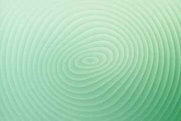 Top view of a green concentric circle pattern, creating a visually appealing and calming texture, perfect for backgrounds and design elements