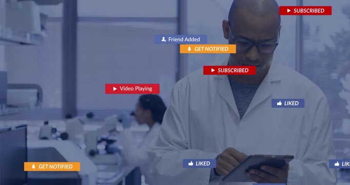 Scientist tapping tablet in lab animating subscribe like badges for engagement before receding - Powered by Adobe