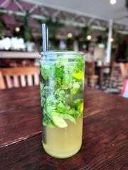 mojito cocktail on wooden table