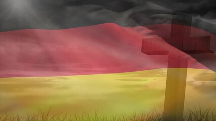 Storm clouds parting causing beam lighting field and red-gold flag waving beside cross silhouette - Powered by Adobe