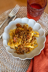 homemade recipe for pasta with Bolognese sauce and cheese