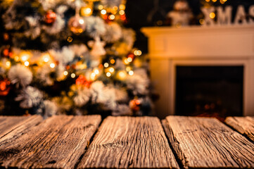 wooden table and blurred Christmas tree in background