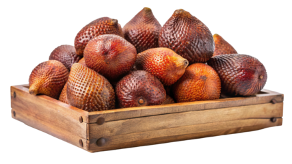 A wooden crate filled with ripe red and brown salak snake fruit a tropical delicacy isolated on transparent background