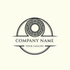 Elegant company logo template featuring an intricate geometric mandala within a stylized eye symbol.