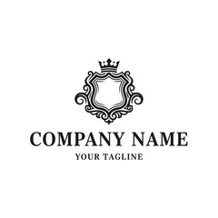 Elegant black and white logo featuring a crown atop a decorative shield with company name and tagline.