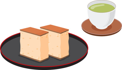 お盆に乗ったカステラとお茶のセット