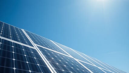 Solar panels under a clear blue sky, representing clean energy and sustainability.