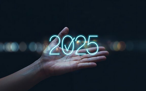 Businessman pointing at Set goals quality for 2025, goal achievement planning, Business new year, businessman holds text 2025, service and quality, symbolizing future growth, implementation of busines