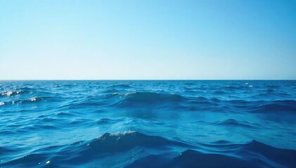 Vast expanse of deep blue ocean water, waves gently rolling under a clear sky Perfect for travel, nature, and environmental themes , horizon, holiday