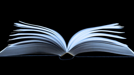 An open book with its pages spread out against a black background, representing knowledge and learning.