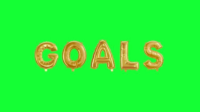 Goal message in foil balloon golden words on green background