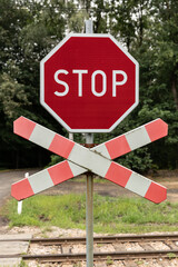 Znak stop przy przejeździe kolejowym / Stop sign at railway crossing