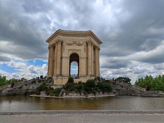 Fototapeta premium Historic stone monument with arch and fountain