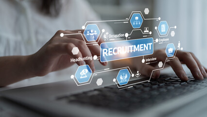 A person interacts with a laptop displaying recruitment graphics, including icons related to hiring and interviews, emphasizing modern employment practices in a professional setting. Tessel
