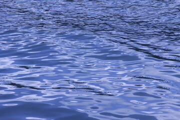 cloud reflection on the wavy sea