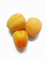 fresh apricots on the white background