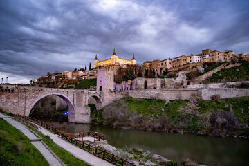 The wall and moat around the medieval city of Toledo, Spain