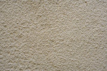 The texture of a simple white plastered and painted wall