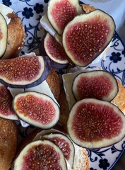 figs on a plate with cheese 