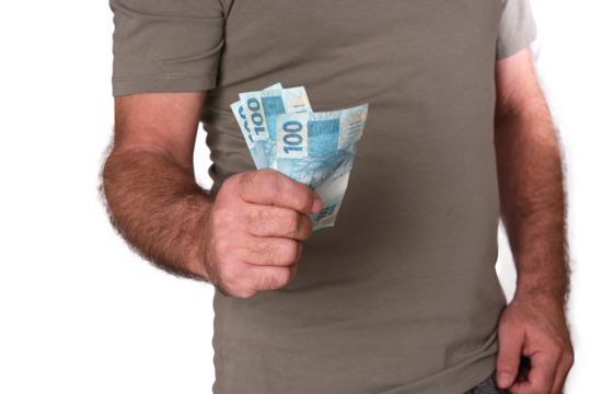 Goiânia, Brazil, September 17, 2025: Financial value of Brazilian real notes. Man holding money in cedula. Economy.