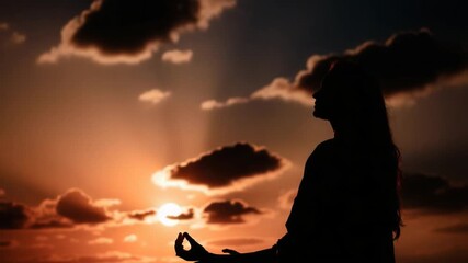 Sunset meditation silhouette - Powered by Adobe