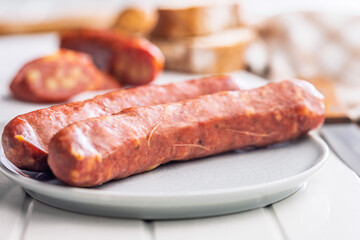 Sliced smoked ​​sausage on plate