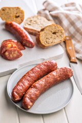 Sliced smoked ​​sausage on plate