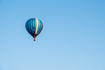 Colorful Hot Air Balloon Floating in Clear Sky