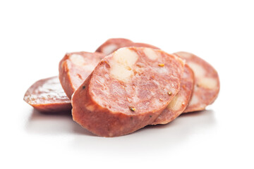 Sliced smoked ​​sausage isolated on white background.