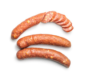 Sliced smoked ​​sausage isolated on white background.