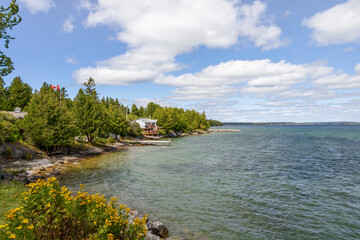 Tranquil South Baymouth on Manitoulin Island offers stunning views of Ontario's natural beauty with its serene shoreline and lush greenery.