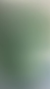 Abstract yellow green blue color gradient video background with soft blur and warm ambient fade effect for ideal header design and poster web banner reels background.