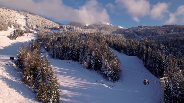 Aerial view ski hill and gondola, Whistler mountain, downhill ski. 4K 24FPS