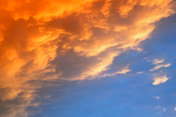 Colorful sky in the evening with a layer of clouds