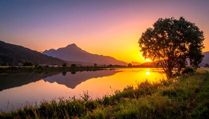 Sunrise Over Calm Lake and Mountains.
