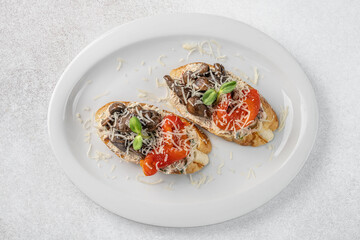 Bruschetta with mushrooms and tomatoes