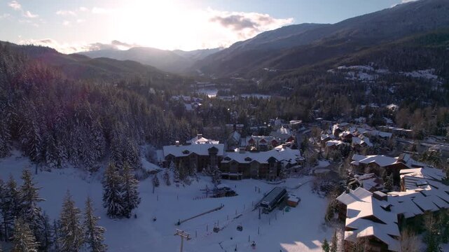 Whistler Creekside town aerial view at sunset, mountain village, ski resort, gondola. 4K 24FPS