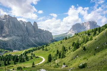 Mountain trail winding through Gardena Pass in Dolomites Alps